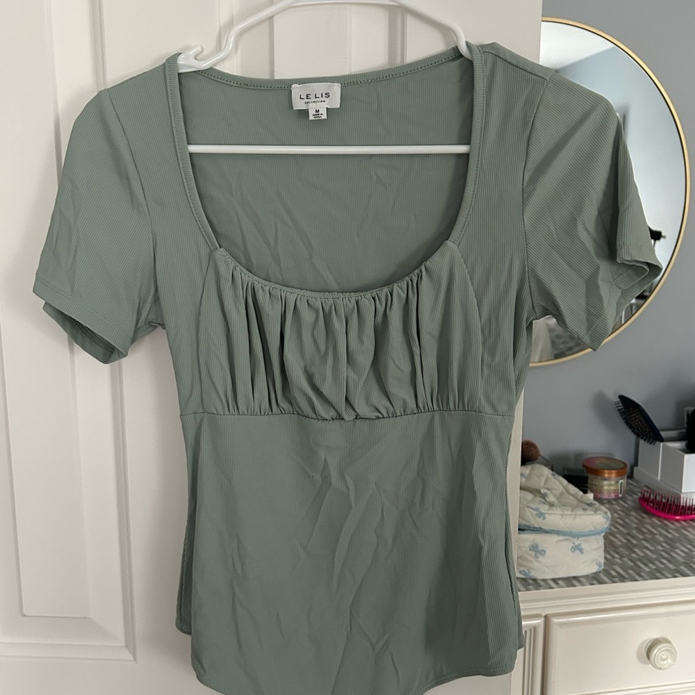 Light green bodysuit